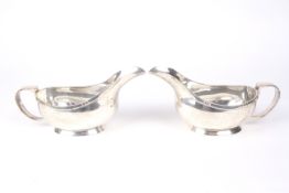 A pair of Art Deco silver sauce boats.