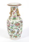 A late 19th century Chinese Famille Rose rouleau shape vase.