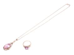 A treated-pink topaz single stone ring and a similar vintage pendant.