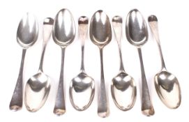 Seven Georgian silver serving spoons.