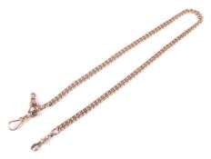An early 20th century 9ct rose gold curb link watch chain. Each link stamped '9' & '.