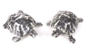 Two Christofle white metal model of tortoises.