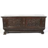 A 19th century Continental carved walnut cassone.