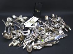 A collection of silver plated flatware.