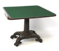 A 19th century rosewood fold over table.
