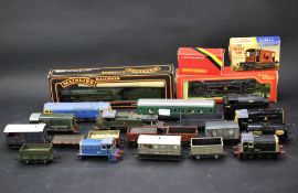 An assortment of OO gauge trains and tenders.