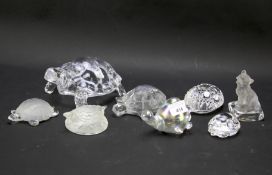 An assortment of glass and crystal animals.