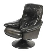 A 20th century reclining leather upholstered Stressless style armchair.