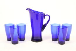 A Bristol Blue style glass lemonade set. With an angular shaped jug H24.
