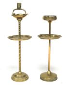Two brass smoking stands.