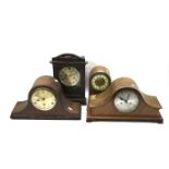 Four early 20th century wooden cased mantel clocks.