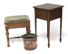 An early 20th century mahogany sewing table, a piano stool and a copper bucket.