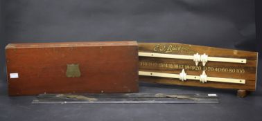 An Arnold & Sons wooden box, a E. J. Riley billiard scoreboard and a rule.