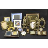 A collection of 20th century brass photo frames.