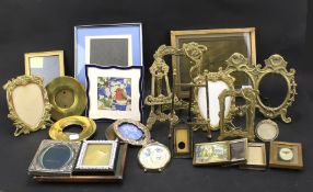 A collection of 20th century brass photo frames.