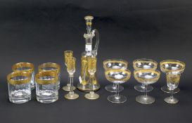 An assortment of gilt decorated glassware.