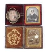 Two daguerreotype type Victorian photographs and one other.