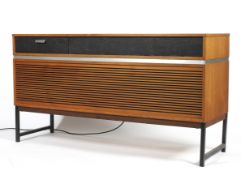 A stylish Decca SRG727 stereo radio stereo gram sideboard. Of rectangular form in working order.