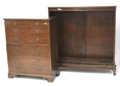 A 20th century mahogany veneered two door cupboard and a bookshelf.