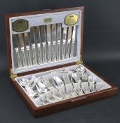 A Viners wooden canteen of silver plated cutlery.