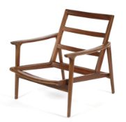 A mid-century teak arm chair frame.