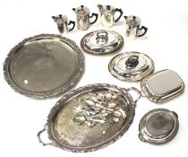 An assortment of silver plate, stainless steel and metalware.
