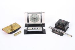 A collection of Successionist and Art Deco style desk accessories.