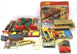 An assortment of OO gauge railway accessories.