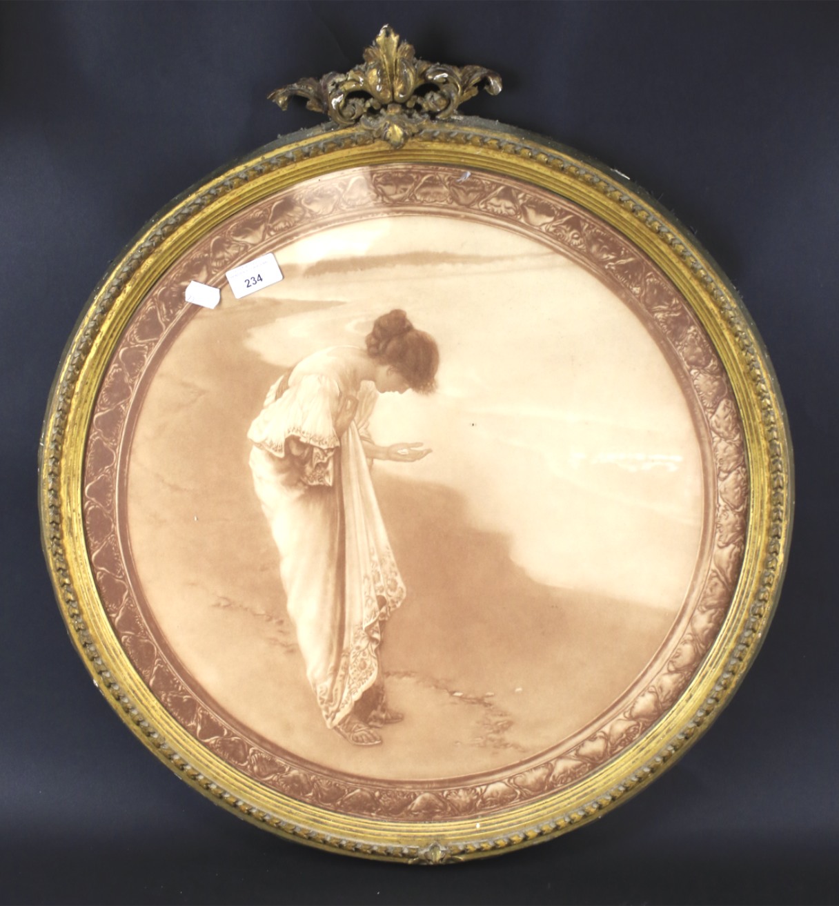 A late 19th century ornate gilt framed print of a lady.