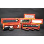 An assortment of Hornby OO gauge locomotives, carriages and freight stock.