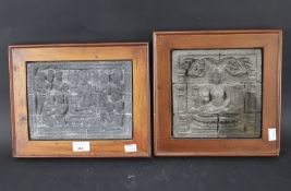 A pair of reconstituted stone plaques depicting Buddha in various poses.