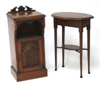 A Victorian mahogany bedside cabinet and an oak occasional table.
