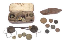 An 18th century cased set of travelling coin scales.