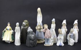 Eleven ceramic figures.