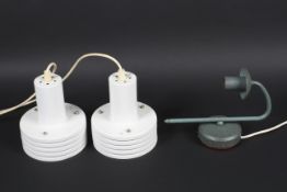 A pair of retro white powdered coated lampshades and a wall llight.