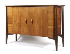 A mid-century Everest walnut sideboard retailed by Heals.