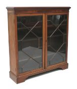 A 20th century mahogany display cabinet.