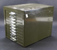 A metal ten-drawer table top cabinet.