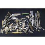 An assortment of silver plated flatware.