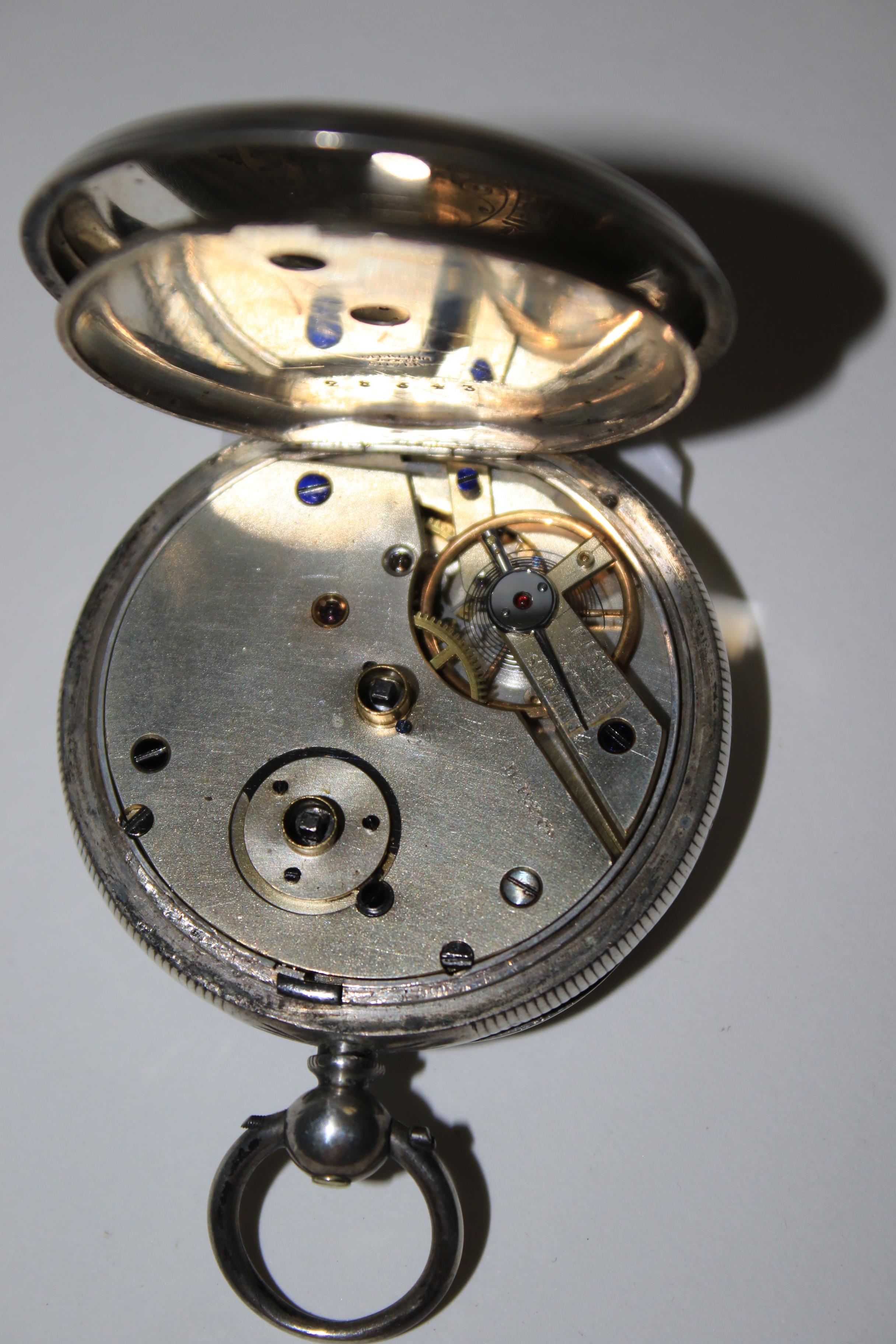 A silver cased open faced pocket watch and another pocket watch. - Image 2 of 3