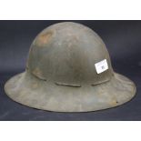 An English WWII British Civil Defence ARP steel helmet. With the original liner, chin strap present.