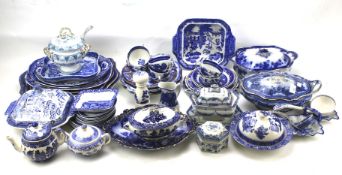 A large assortment of blue and white ceramics.