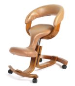 A contemporary Rybo Balans kneeling chair.