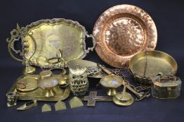 A collection of brassware.