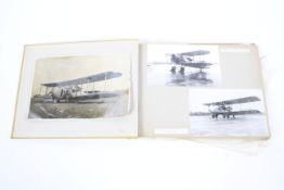 A mid century photograph album containing various photos.