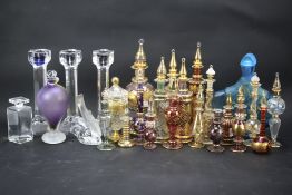 An extensive collection of glass scent bottles.