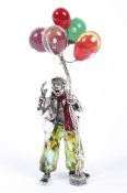 An art glass and white metal Murano glass balloon seller.