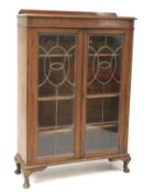 A 20th century mahogany display cabinet.