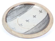 A Bernard Leach (1887-1979) Studio pottery dish.