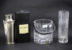 A Kosta Boda glass ice bucket, glass vase and a nickel cocktail shaker.